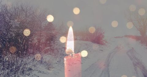 Candlelight Illuminates Snowy Winter Road Amid Sparkling Lights - Download Free Stock Images Pikwizard.com
