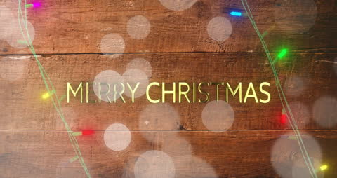 Festive Merry Christmas Text with Fairy Lights and Bokeh