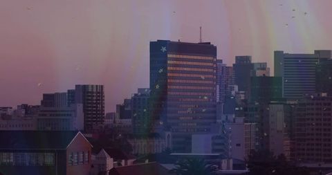 Modern city skyline at dusk with twilight glow