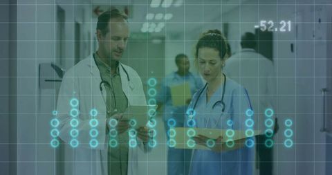 Healthcare Professionals Analyzing Data in Hospital Environment