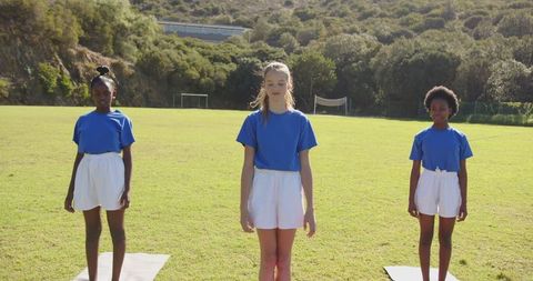 Diverse Children Practicing Yoga Mountain Pose Outdoors