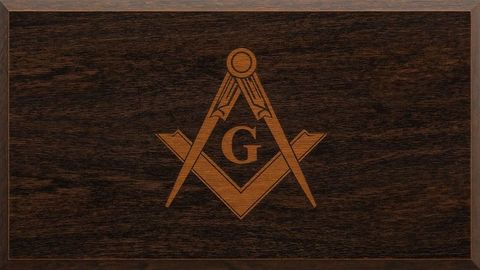 Masonic symbol on rustic wooden background emblem of legacy