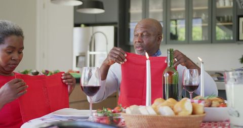 Senior Couple Enjoying Meal Together at Home
