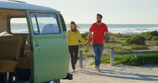 Young Couple Enjoying Day at Beach with Vintage Camper Van - Download Free Stock Images Pikwizard.com