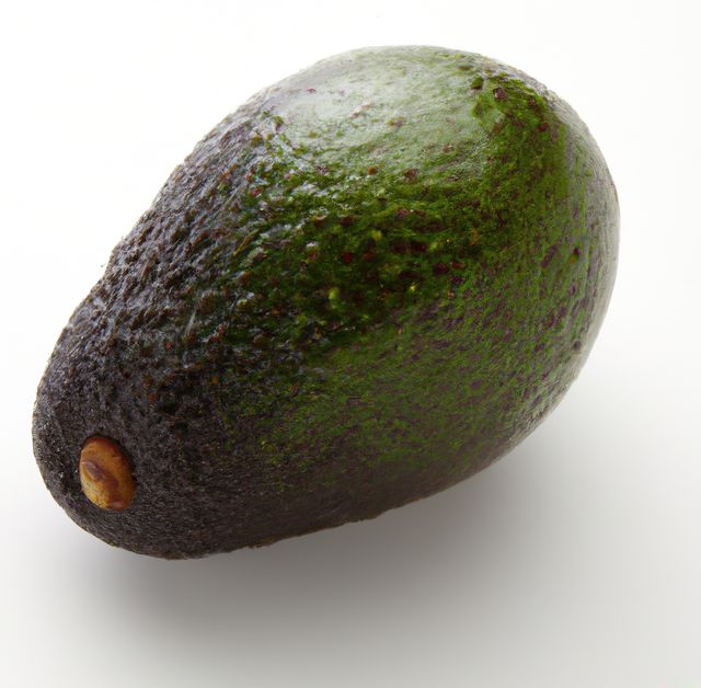 Close up of green avocado on white background created using generative ai technology - Download Free Stock Photos Pikwizard.com