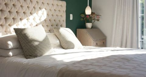 Minimalist bedroom with soft light and elegant decor