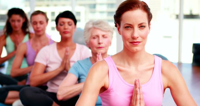 Women of Various Ages Practicing Yoga in Class - Download Free Stock Images Pikwizard.com