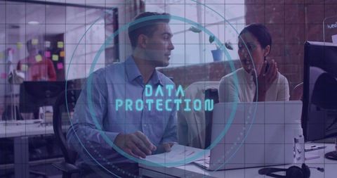 Colleagues Discussing Data Protection in Modern Office