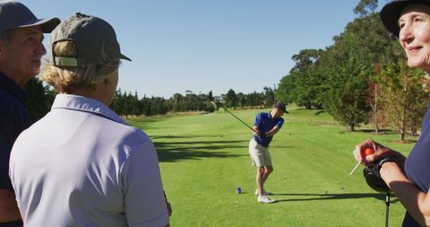 Senior Golf Enthusiasts Enjoying a Game in Lush Green Setting - Download Free Stock Images Pikwizard.com