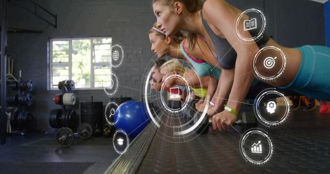 Group core plank training with fitness hud overlay, stability ball and strength analytics
