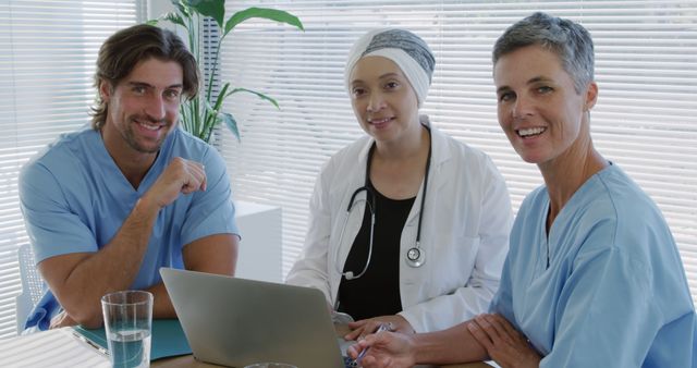 Diverse Medical Team Collaborating on Research in Hospital Office - Download Free Stock Images Pikwizard.com