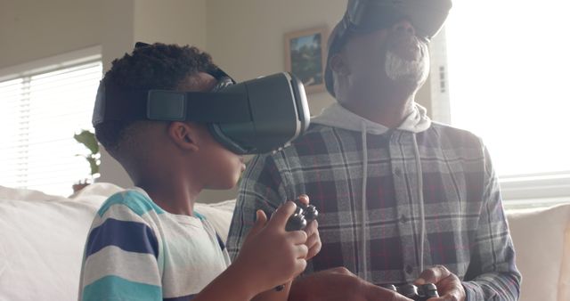 Grandfather and Grandson Bonding with Virtual Reality Gaming at Home - Download Free Stock Images Pikwizard.com