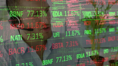 Businessman Analyzing Financial Data Projected on Screen