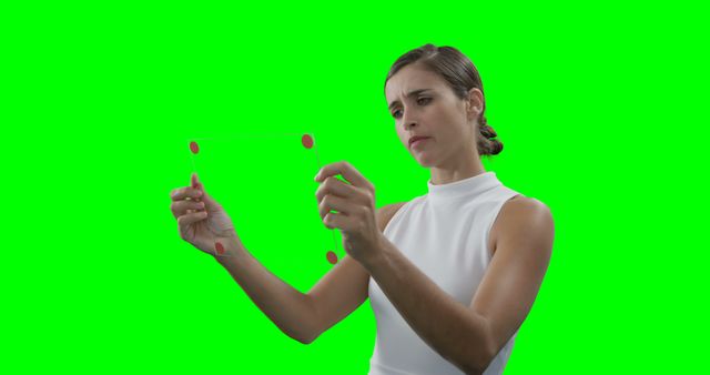 Woman Using Transparent Tablet with Green Screen Background - Download Free Stock Images Pikwizard.com