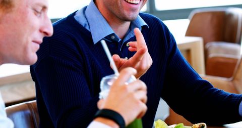 Smiling Business People Networking Over Lunch
