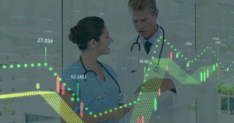 Medical professionals analyzing digital charts in clinical setting