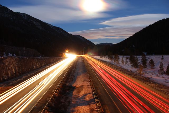 Long Exposure Light Trails on Mountain Highway at Night - Download Free Stock Photos Pikwizard.com