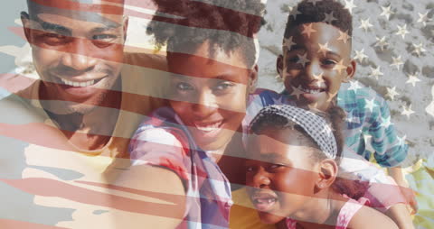 Patriotic Family Celebrating Unity with Overlay of American Flag