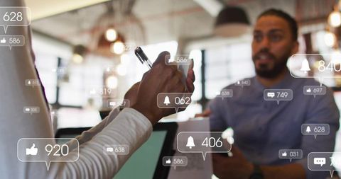 Female writing on smartphone at coworking desk with social media notification overlays