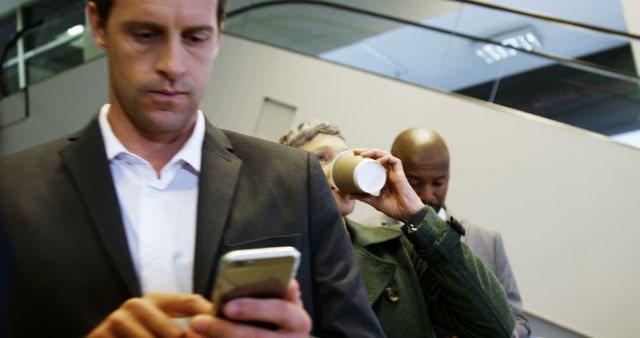 People Waiting in Line for Coffee in Office Building - Download Free Stock Images Pikwizard.com