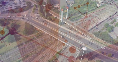 Aerial View of Modern Highway Bridge over Railway and Intersection