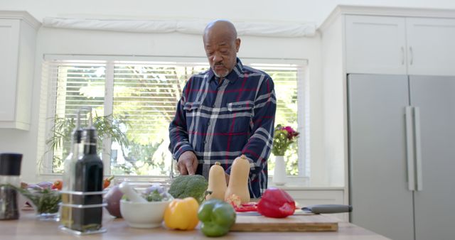 Senior Man Cutting Vegetables in Modern Home Kitchen - Download Free Stock Images Pikwizard.com