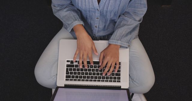 Person Typing on Laptop While Sitting Cross-Legged on Floor - Download Free Stock Images Pikwizard.com