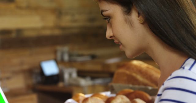 Woman Choosing Fresh Bread at Bakery Counter - Download Free Stock Images Pikwizard.com