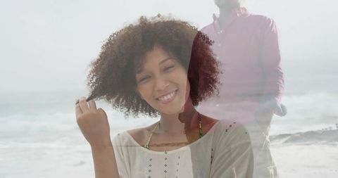 Smiling Woman at Beach Enjoying Relaxing Summer Day