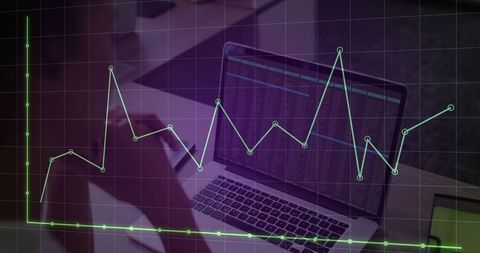 Businesswoman analyzing data with overlayed line graph