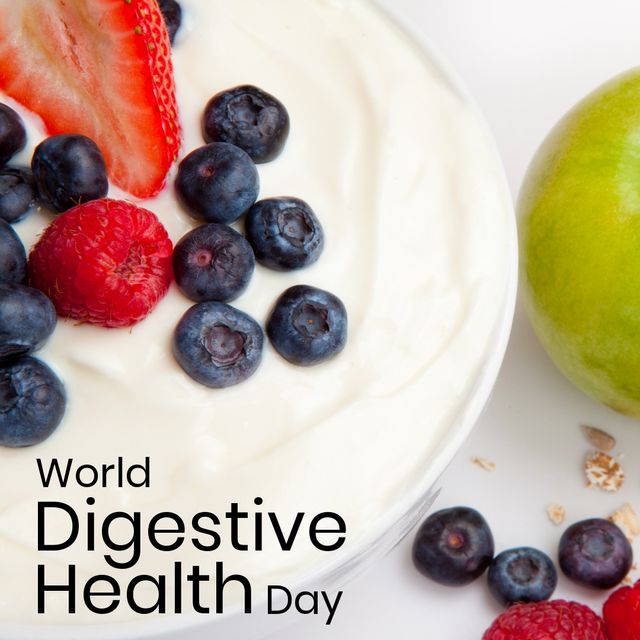 Image featuring a delicious bowl of yogurt topped with fresh blueberries, raspberries, and strawberries, promoting World Digestive Health Day. Perfect for highlighting healthy eating habits, nutrition awareness, balanced diet, and overall wellness. Ideal for use in health-related articles, wellness blogs, nutritional guides, or social media promotions.