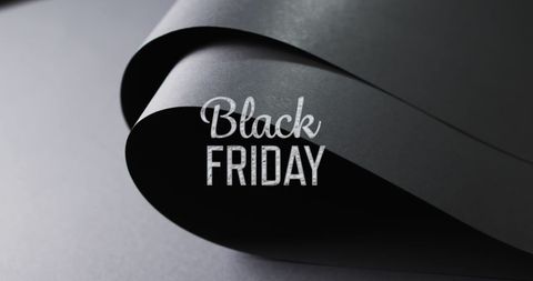 black friday sale over rolled up black paper - Download Free Stock Images Pikwizard.com
