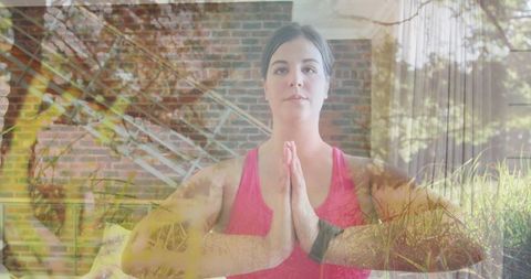 Meditative Woman Doing Yoga at Home with Tranquil Garden Setting