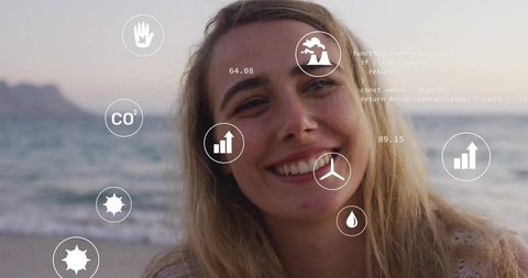 Smiling Woman on Beach with Eco Icons Overlaid, Highlighting Technology