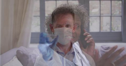 Mature doctor overlapping worried senior woman on smartphone