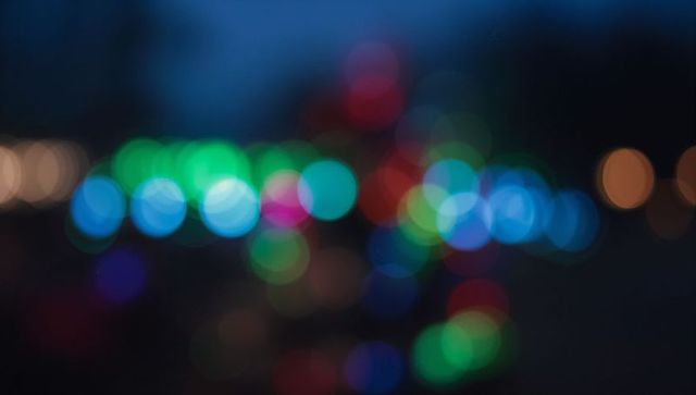 Vibrant multicolored bokeh light pattern in urban night