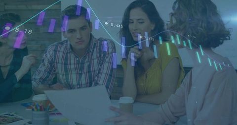 Team analyzing data trends in modern work environment