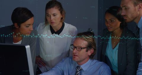 Diverse Business Team Discussing Digital Data Analysis