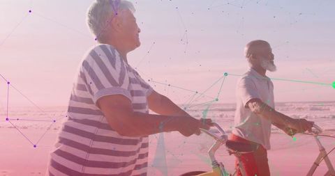Senior Couple Enjoying Biking Along Scenic Beachfront
