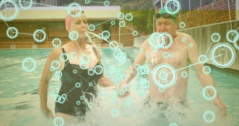 Couple enjoying aquatic recreation in outdoor pool with digital elements