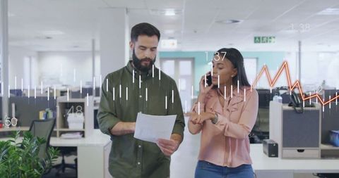 Colleagues analyzing financial data in modern office technology overlay