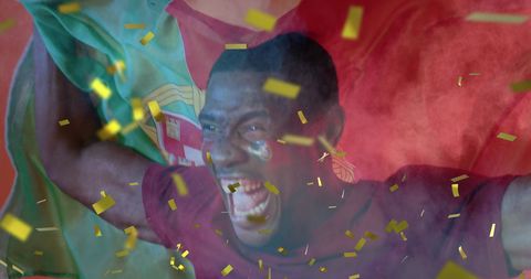 Excited Sports Fan Celebrating with Portugal Flag and Confetti