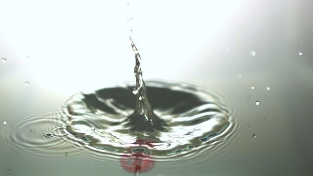 Ripple effect of water suggests motion and liquid dynamics. Suitable for advertisements focusing on beverages or health products due to its association with freshness and purity. Can be used for educational content on motion or physics in water. Visually appealing with a sense of calm introduced by the water’s natural movement.