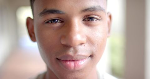 Close-up of Biracial Teen Smiling with Confidence