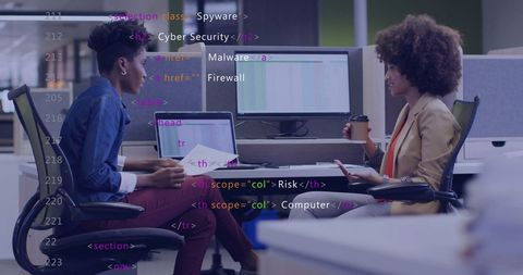 Diverse Business Discussion Amid Cybersecurity Elements