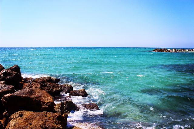 Scenic Rocky Seashore with Clear Turquoise Water - Download Free Stock Photos Pikwizard.com