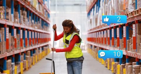 Warehouse Worker Managing Goods in Industrial Logistics Facility