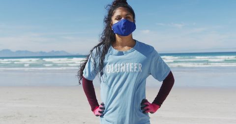 Volunteer woman participating in beach cleanup
