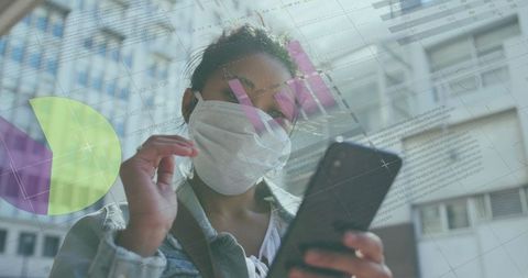 Businesswoman Interacting with Financial Data on Smartphone During Pandemic