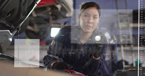 Female Mechanic Inspecting Engine Bay with Diagnostic Overlays and Handheld Light